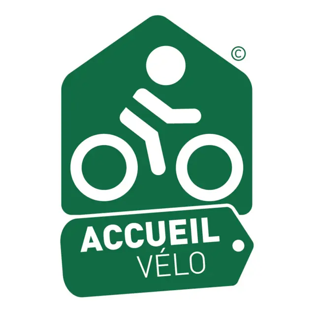 Green sign with a bicycle and pedestrian pictogram, accompanied by the text Accueil Vélo