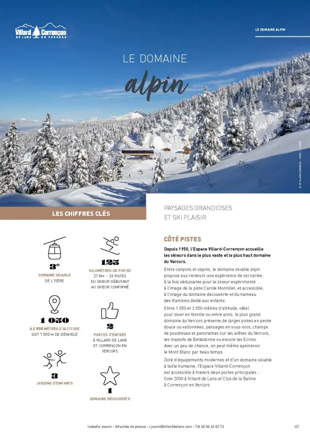 Snow-covered mountain landscape with ski slopes and ski lifts