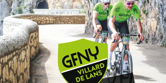 Manifesto promozionale del GFNY Villard-de-Lans 2026 con un ciclista in tenuta verde e un percorso in montagna
