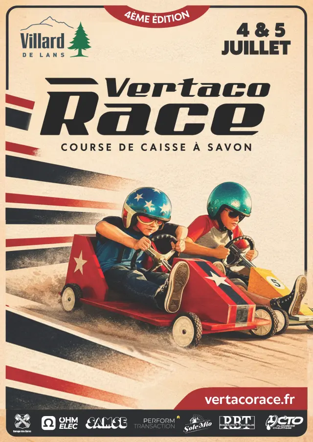 Two drivers in racing suits inside a red and orange soapbox car on a race track